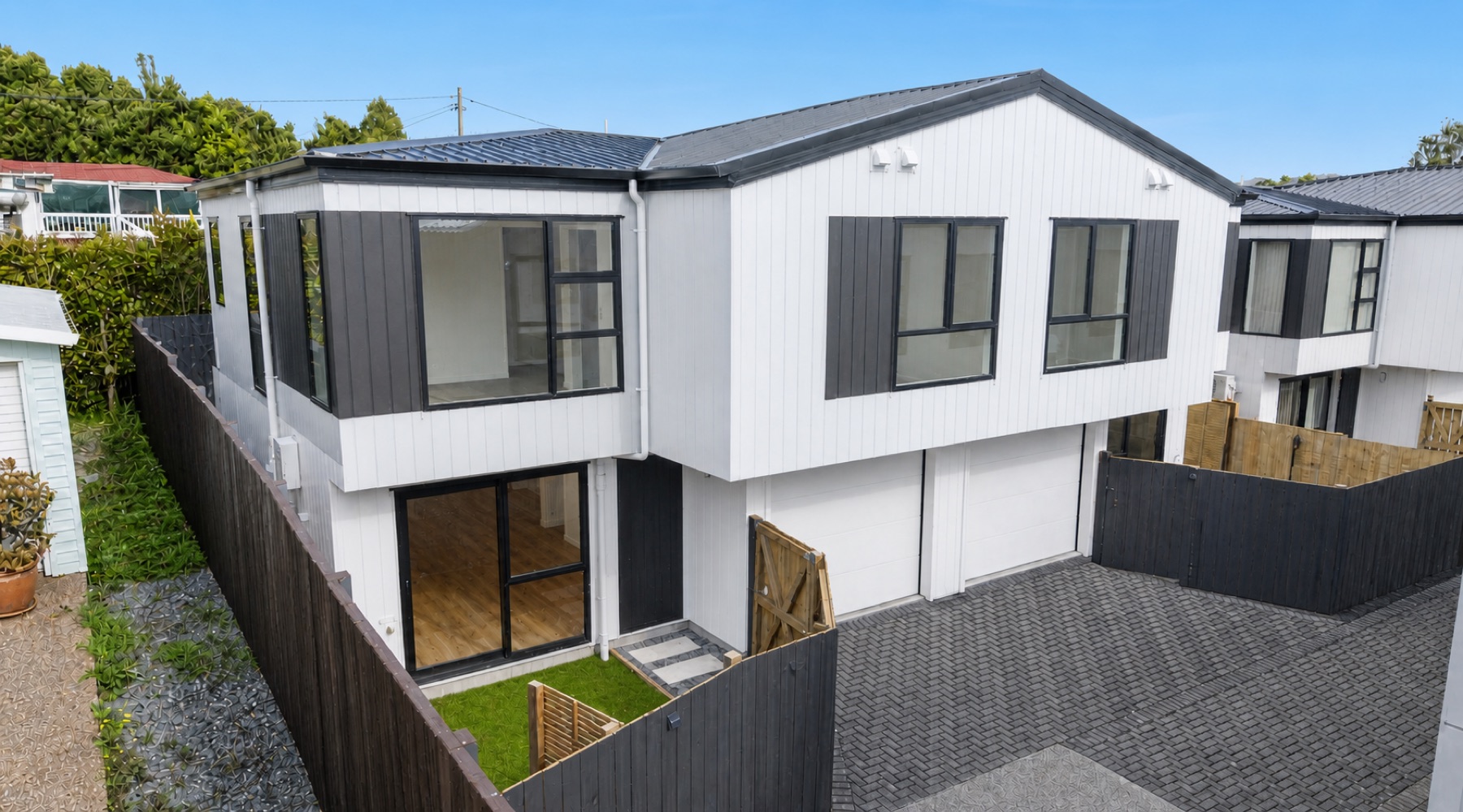 Townhouse exterior at 9 Kaikoura Street, Henderson