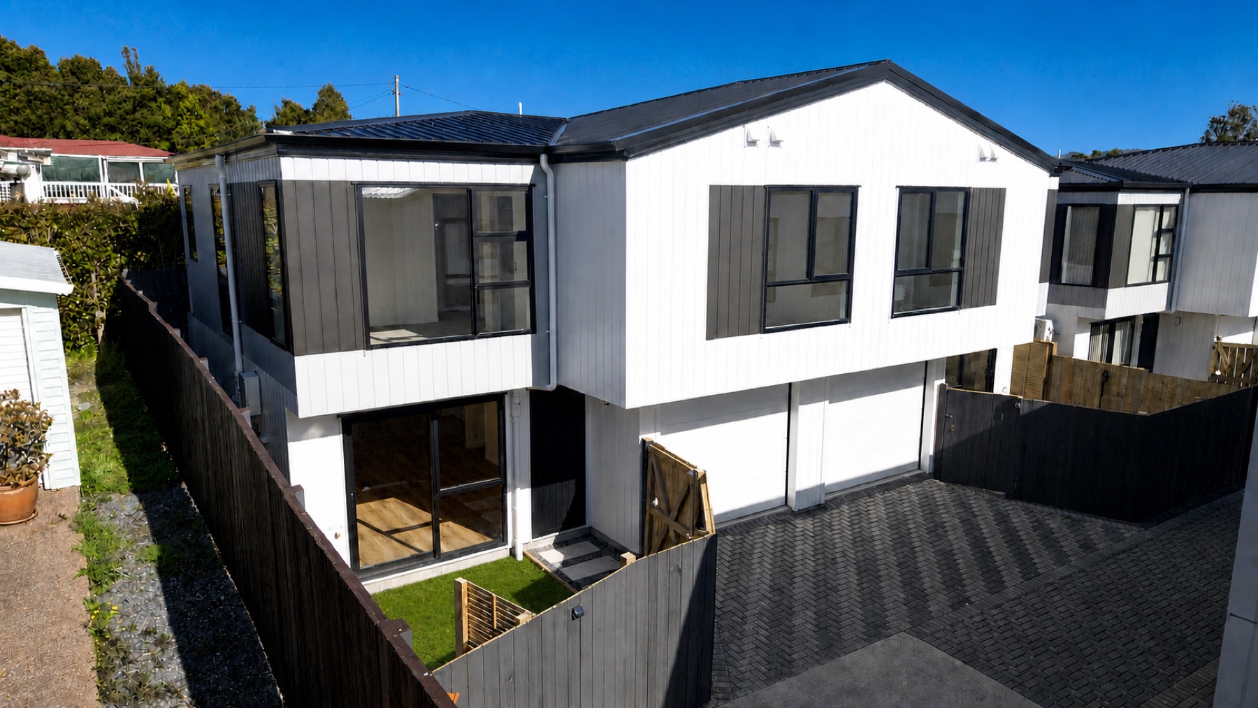 Townhouse exterior at 9 Kaikoura Street, Henderson